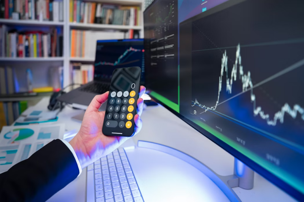 A imagem retrata um ambiente de trabalho de finanças, análise de mercado ou trading.